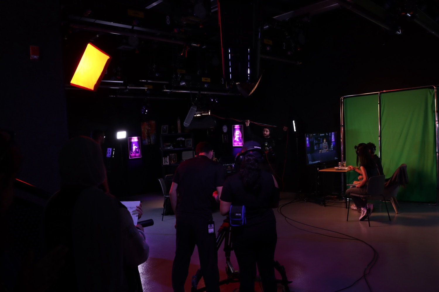 Crew, lighting and rigs on a film set